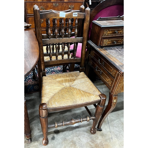 1036 - A pair of Lancashire elm and beech rush seat chairs