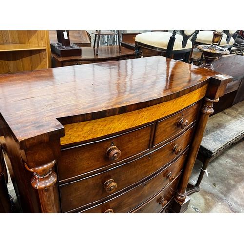 1039 - A large mid Victorian mahogany bow front chest of two short and three long drawers, bird's eye maple... 