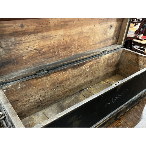 1042 - A small Victorian iron bound pine trunk, length 89cm, depth 30cm, height 30cm