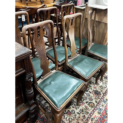 1045 - A set of six Georgian walnut dining chairs