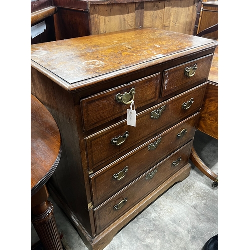 1058 - A George III mahogany banded oak chest of drawers, width 81cm, depth 49cm, height 92cm