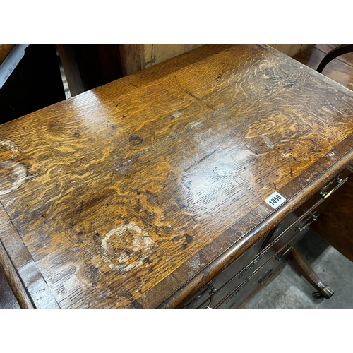 1058 - A George III mahogany banded oak chest of drawers, width 81cm, depth 49cm, height 92cm