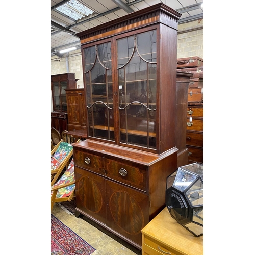 1016 - A George III banded mahogany secretaire bookcase, width 117cm, depth 58cm, height 234cm