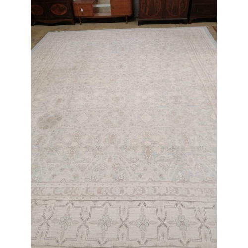 1017 - A modern North West Persian design aquamarine and ivory ground carpet, 480 x 370cm