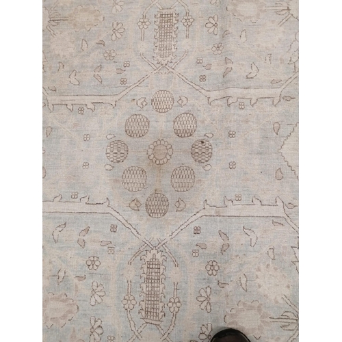 1017 - A modern North West Persian design aquamarine and ivory ground carpet, 480 x 370cm