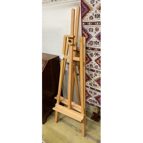 1019 - Two modern Windsor and Newton beech artists' studio easels, larger height 173cm