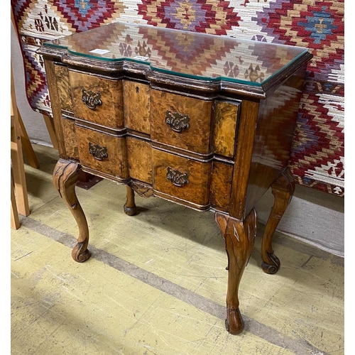 1021 - A Queen Anne revival serpentine walnut and simulated walnut two drawer side table, width 62cm, depth... 