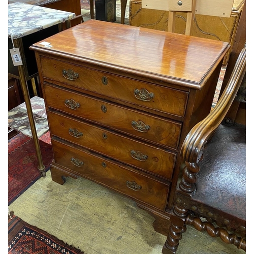 1040 - A small George III mahogany chest of four graduating long drawers, raised on bracket supports, repla... 