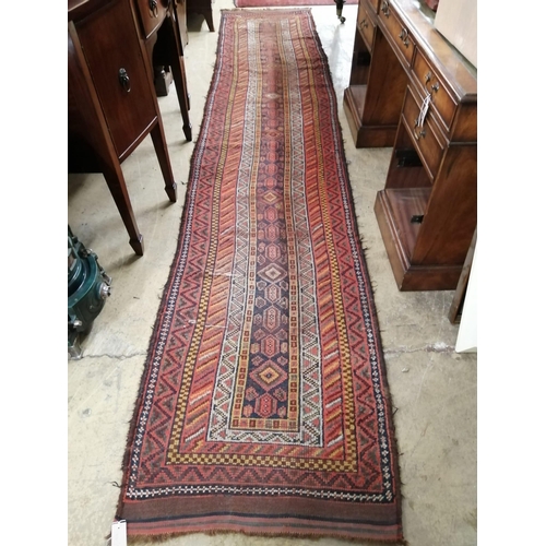 1044 - A Turkish polychrome wool runner, 420 x 80cm