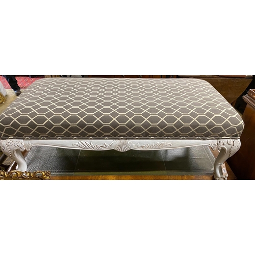 1047 - A George III style rectangular painted upholstered footstool, length 130cm, depth 65cm, height 46cm... 