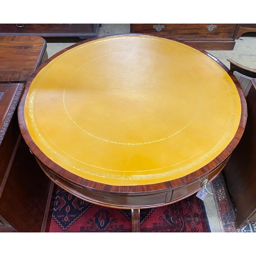 1055 - A Regency and later circular mahogany drum table, diameter 106cm, height 75cm