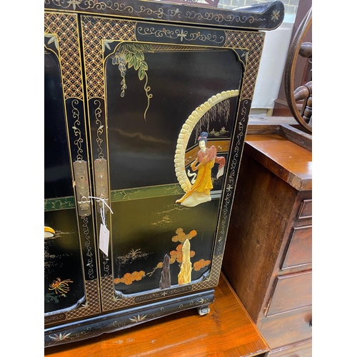 1057 - A Chinese black lacquer hardstone and composition mounted two door side cabinet, width 77cm, depth 4... 