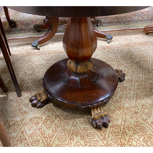 1078 - A Victorian parcel gilt rosewood pedestal now as an occasional table with circular faux porphyry mar... 