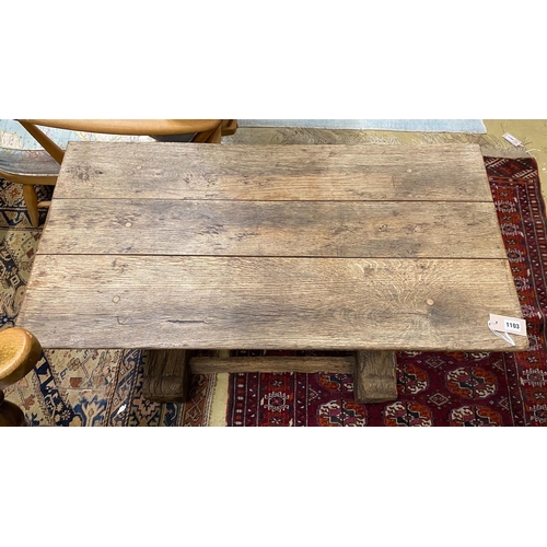 1103 - An antique oak coffee table, (altered) width 98cm, depth 52cm, height 51cm