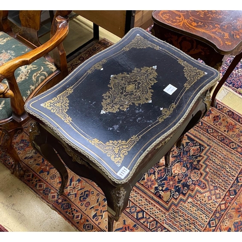 1111 - A late 19th century Louis Philippe cut brass inlaid ebonised work table, marked Tahan, Paris, width ... 