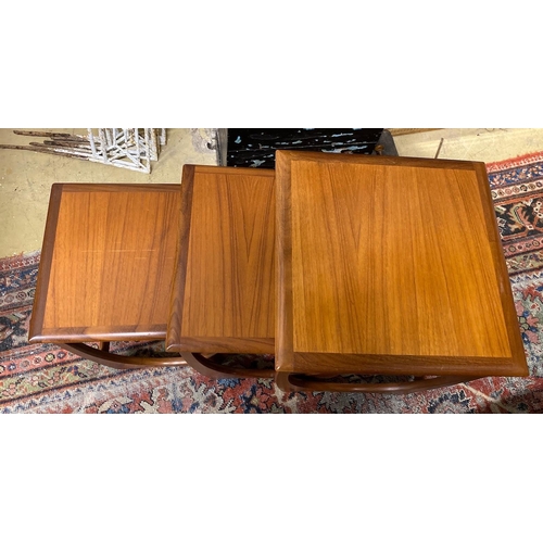 1137 - A nest of three G-Plan teak tables, width 50cm, depth 50cm, height 50cm