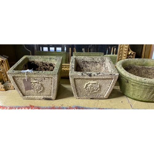 1140 - A pair of square reconstituted stone garden planters, height 19cm and a larger oval planter