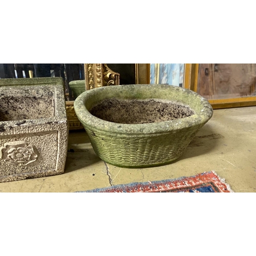 1140 - A pair of square reconstituted stone garden planters, height 19cm and a larger oval planter