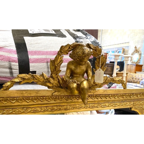 1155 - A Victorian giltwood and composition overmantle  mirror with cherub pediment width height