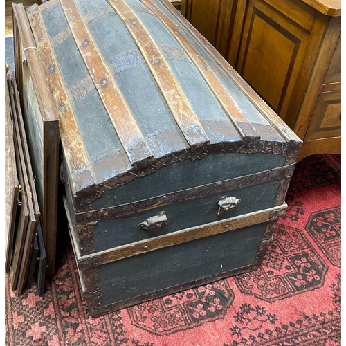 1176 - An early 20th century dome top travelling trunk, width 92cm, height 56cm