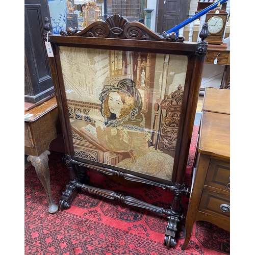 1178 - A Victorian rosewood firescreen inset polychrome tapestry panel, width 79cm, height 122cm