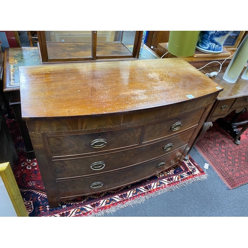 1182 - A George IV mahogany bow front chest, of two short and two long drawers incorporating a secret drawe... 