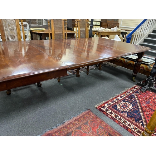 1196 - A Victorian mahogany extending dining table, 320cms extended, three spare leaves, depth 130cms, heig... 