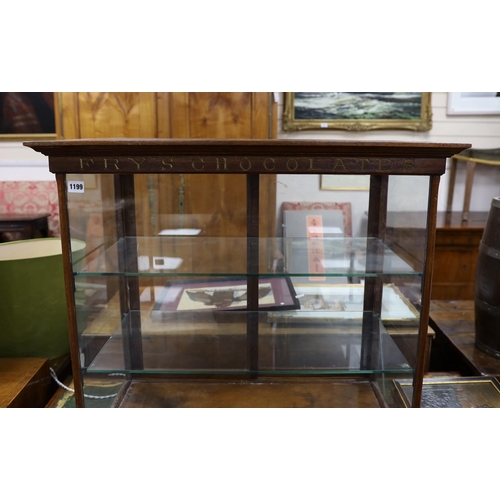 1199 - A late Victorian / Edwardian mahogany Frys Chocolates counter shop display cabinet with gilded lett... 