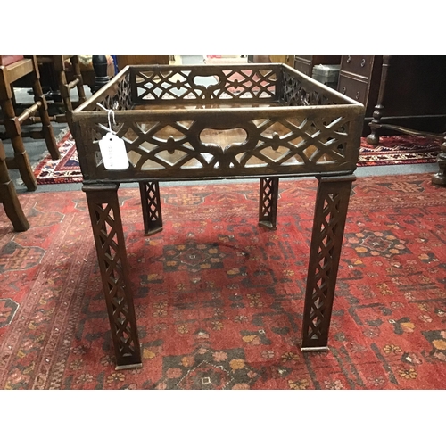 1201 - A George III pierced mahogany rectangular tray now as an occasional table on associated legs, width ... 