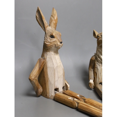 1250 - A pair of carved wood animal peg dolls, a hare and a sheep, hare tallest, 43cms high