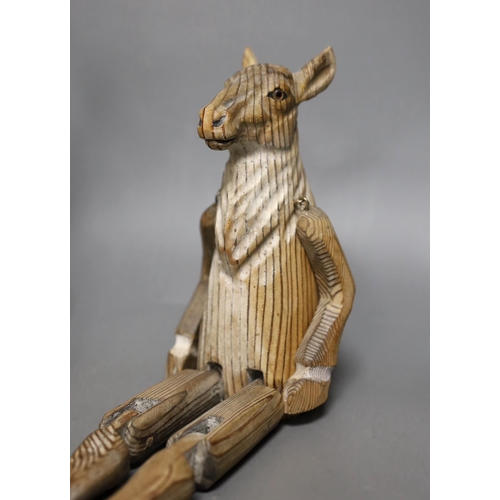 1250 - A pair of carved wood animal peg dolls, a hare and a sheep, hare tallest, 43cms high