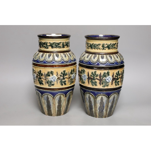 1262 - A pair of Doulton Lambeth vases, c.1885, 25.5cms high (a.f.)