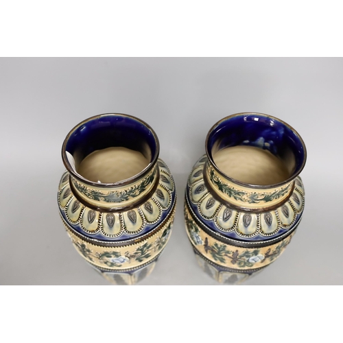 1262 - A pair of Doulton Lambeth vases, c.1885, 25.5cms high (a.f.)