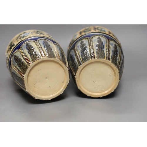 1262 - A pair of Doulton Lambeth vases, c.1885, 25.5cms high (a.f.)