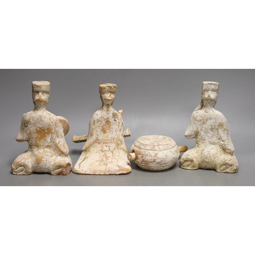 1267 - Three Chinese painted pottery figures of musicians and a model drum, Tang dynasty or later, 18.5cms ... 