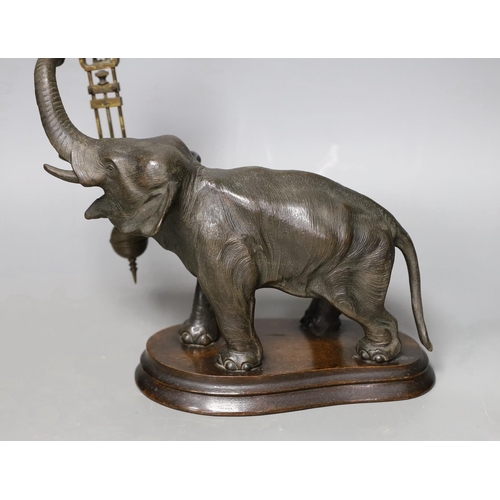 1274 - A patinated spelter elephant mystery timepiece, 29cms high