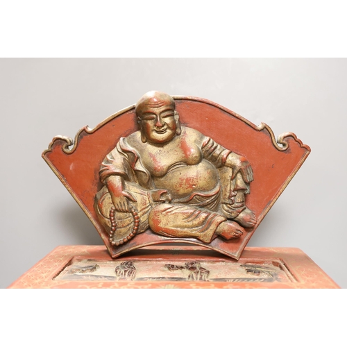 1279 - A Chinese lacquered wood Budai carving, 34cm wide, and a Chinese lacquered wood box (2)