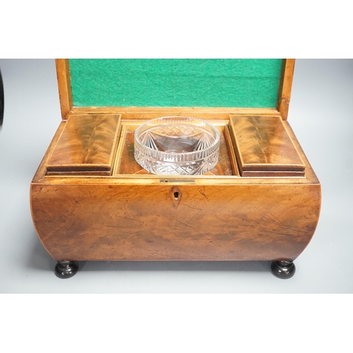 1305 - A  George IV mahogany bombe-shaped sarcophagus tea caddy, 33cms wide