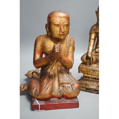 1307 - Two Thai gilt wood figures of Buddha, tallest 41cms high