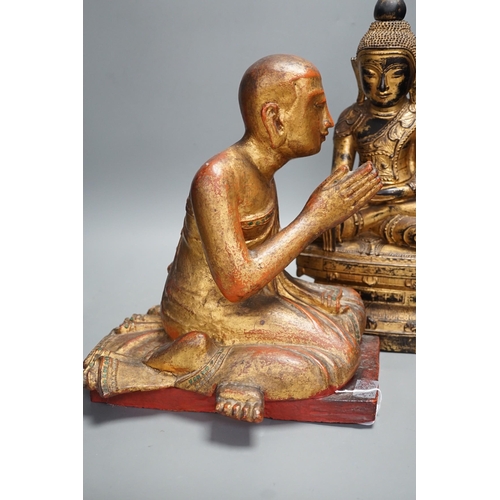 1307 - Two Thai gilt wood figures of Buddha, tallest 41cms high