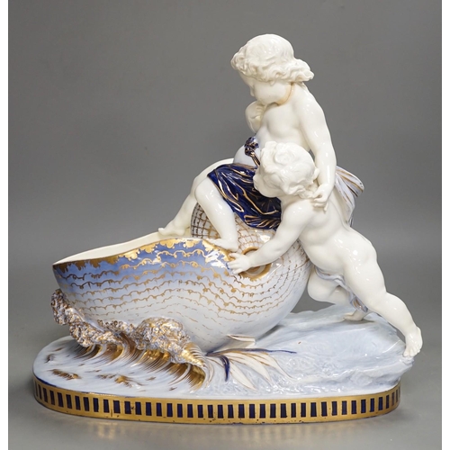 1308 - A Copeland porcelain putti seated on a shell centrepiece, modelled O. Hale, c.1877, 35cms high... 