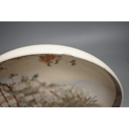 1309 - A Japanese Satsuma pottery dish, Meiji period, three character inscription, 23cms diameter