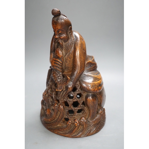 1321 - A Chinese bamboo figure of a fisherman, 19th century, 23cms high