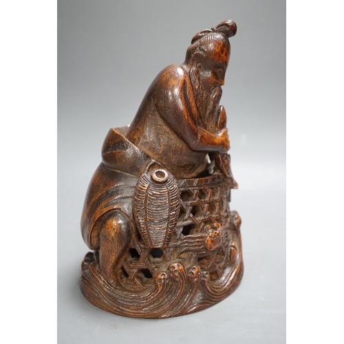 1321 - A Chinese bamboo figure of a fisherman, 19th century, 23cms high