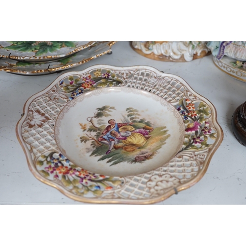 1326 - Two Meissen leaf dishes, a Dresden plate, two group figures and mixed ceramics, tallest 25cms high... 