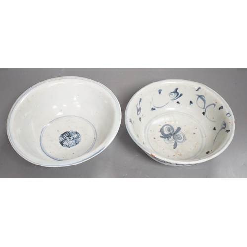 1332 - Two Chinese late Ming blue and white bowls, 16th/17th century, painted with flowers and foliage, 14.... 