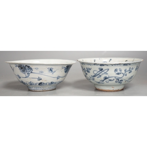 1332 - Two Chinese late Ming blue and white bowls, 16th/17th century, painted with flowers and foliage, 14.... 