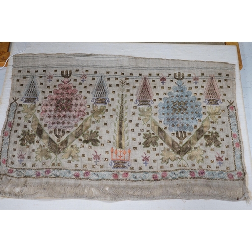 1345 - Two 19th century embroidered Turkish towel ends, one framed, 46cms wide x 30cms high