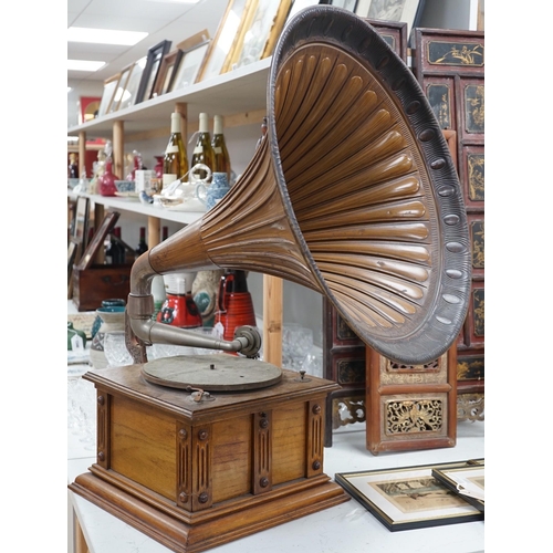 1350 - An early 20th century table top Gramophone, with large metal horn, 80cms high