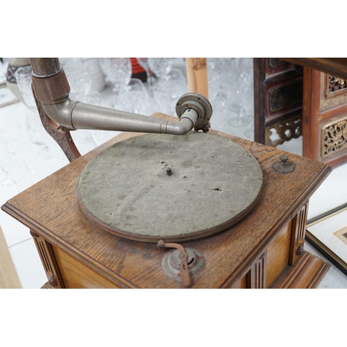 1350 - An early 20th century table top Gramophone, with large metal horn, 80cms high